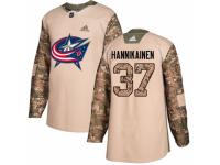 Men Adidas Columbus Blue Jackets #37 Markus Hannikainen Camo Veterans Day Practice NHL Jersey